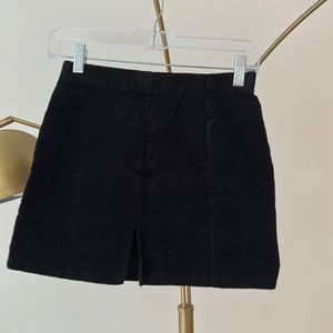 Black slit mini skirt similar to aritzia or princess polly